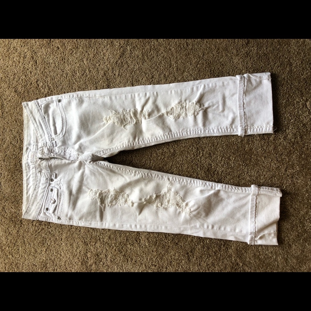 White distressed capris